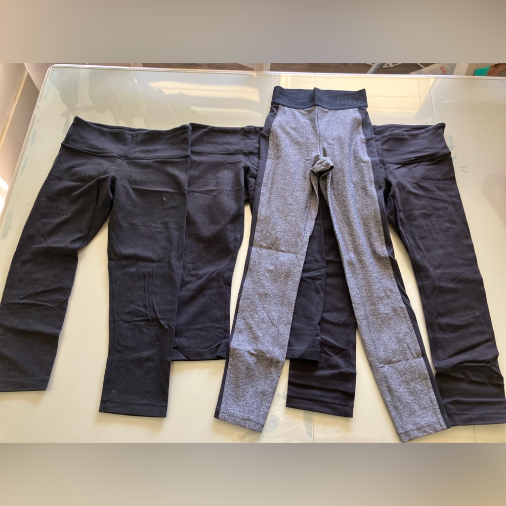 Bundle of 4 Lululemon leggins.